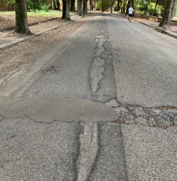 asfalto sconnesso buche zona Caracalla