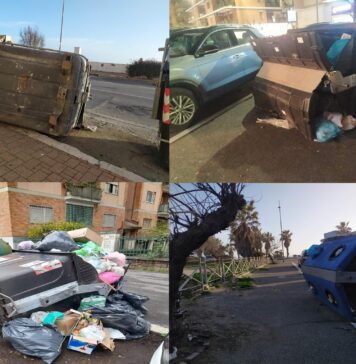 cassonetti rovesciati Ostia rifiuti