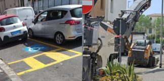 Dipingono la piazzola per disabili e il giorno dopo rifanno l'asfalto: storia di uno spreco a Ostia