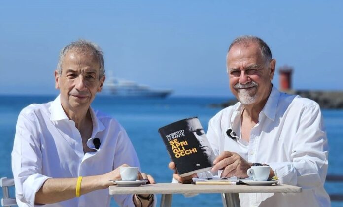 ROBERTO DI SANTE A SX GIULIO MANCINI A DX UBIK EVENTO SE APRI GLI OCCHI LIBRO 2026 FOTO